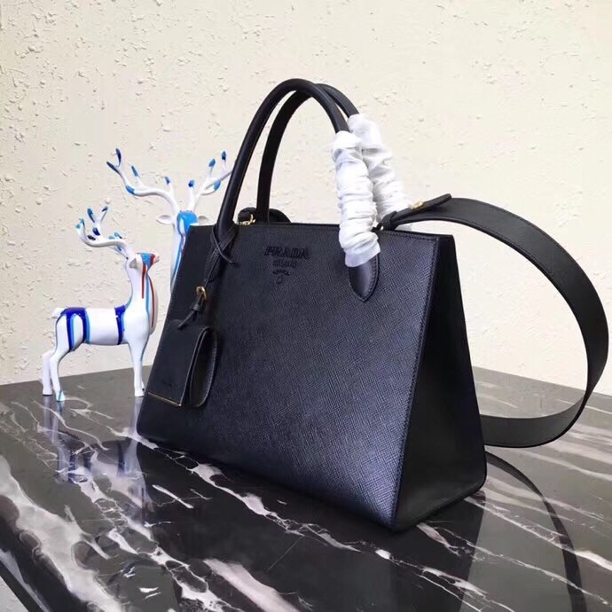pra*a large monoCh*0me bag in black saffiano leather