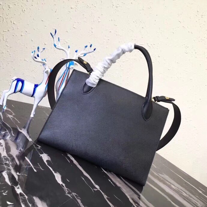 pra*a large monoCh*0me bag in black saffiano leather
