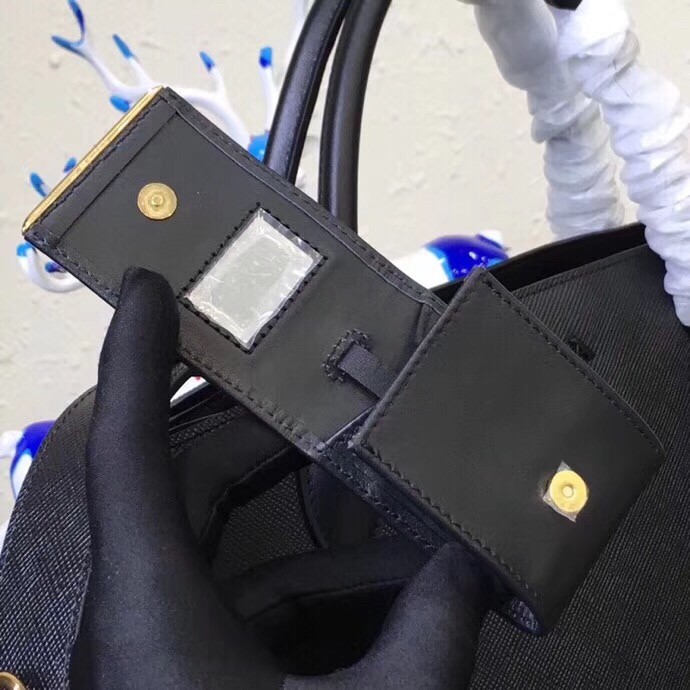 pra*a large monoCh*0me bag in black saffiano leather