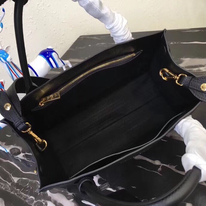 pra*a large monoCh*0me bag in black saffiano leather