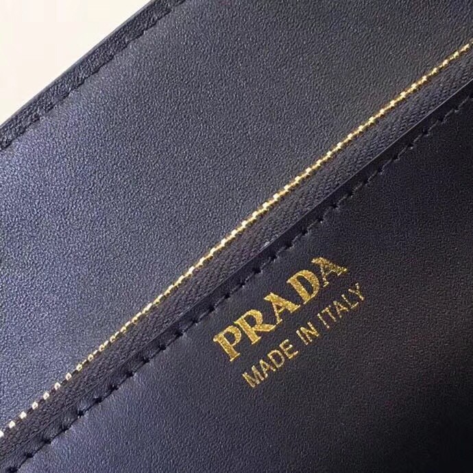pra*a large monoCh*0me bag in black saffiano leather