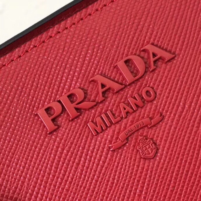 pra*a large monoCh*0me bag in red saffiano leather