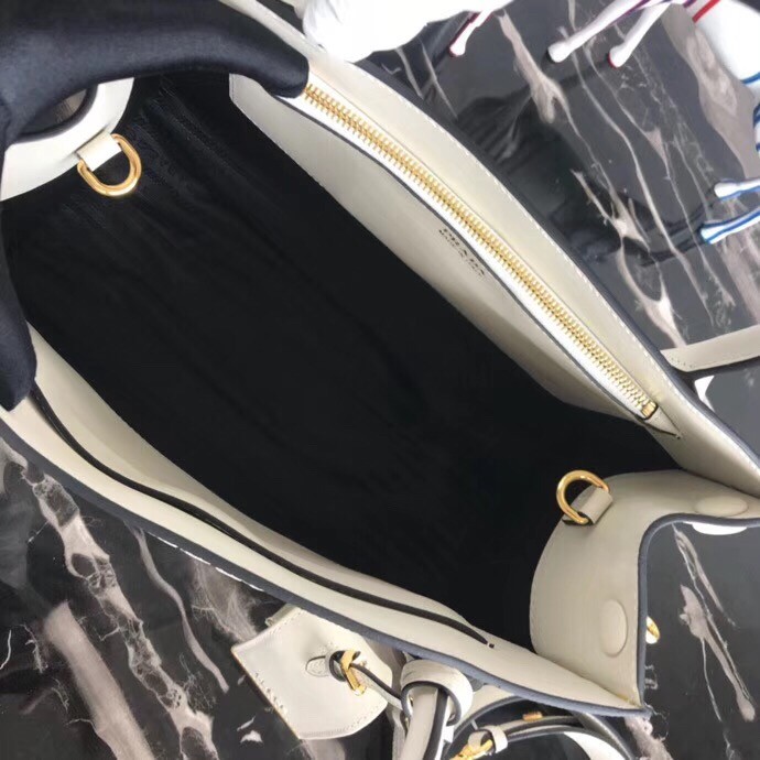 pra*a large monoCh*0me bag in white saffiano leather