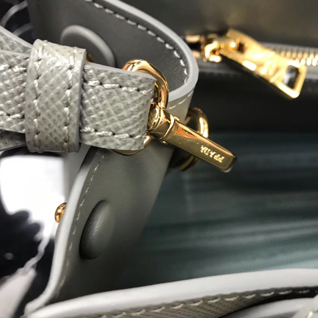 pra*a monoCh*0me bag in grey saffiano leather