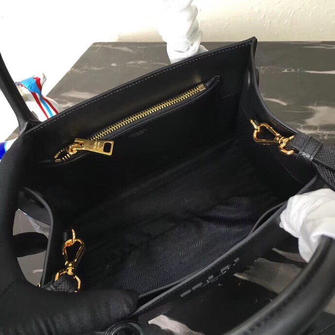 pra*a monoCh*0me bag in black saffiano leather