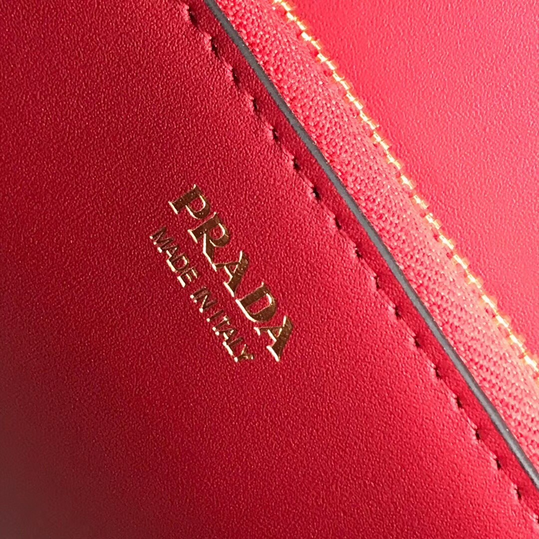 pra*a monoCh*0me bag in red saffiano leather