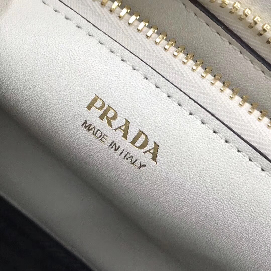pra*a monoCh*0me bag in white saffiano leather