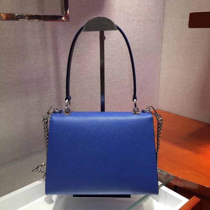 pra*a monoCh*0me top handle bag in blue saffiano leather