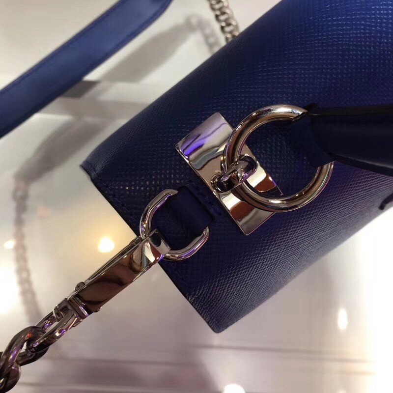 pra*a monoCh*0me top handle bag in blue saffiano leather