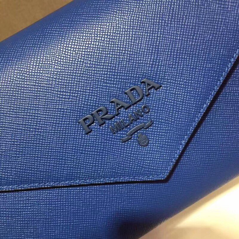 pra*a monoCh*0me top handle bag in blue saffiano leather
