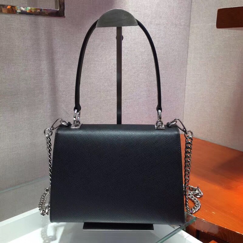 pra*a monoCh*0me top handle bag in black saffiano leather