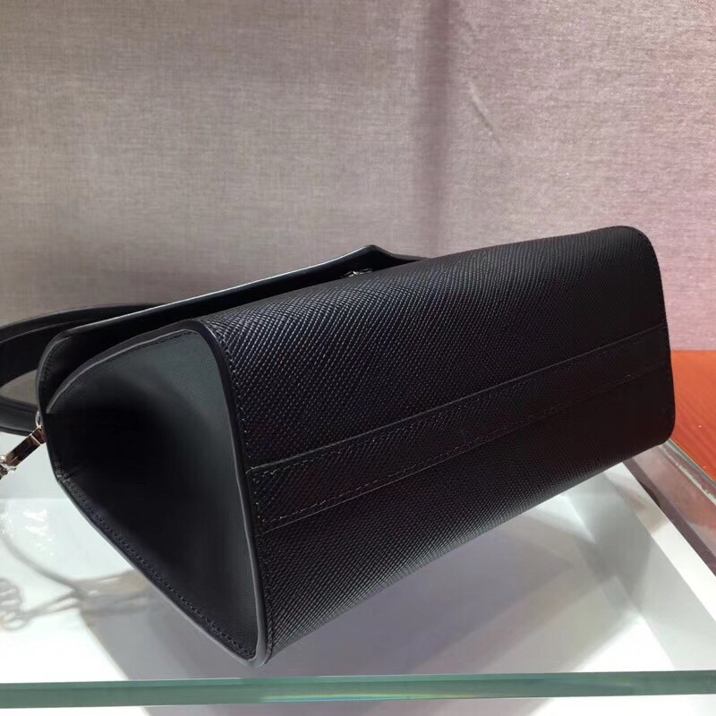 pra*a monoCh*0me top handle bag in black saffiano leather