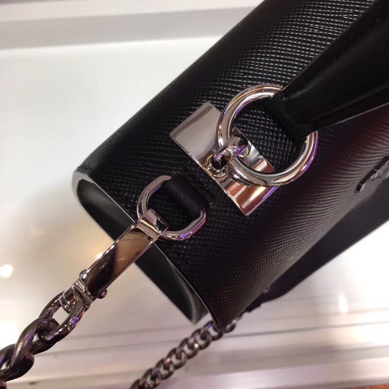 pra*a monoCh*0me top handle bag in black saffiano leather