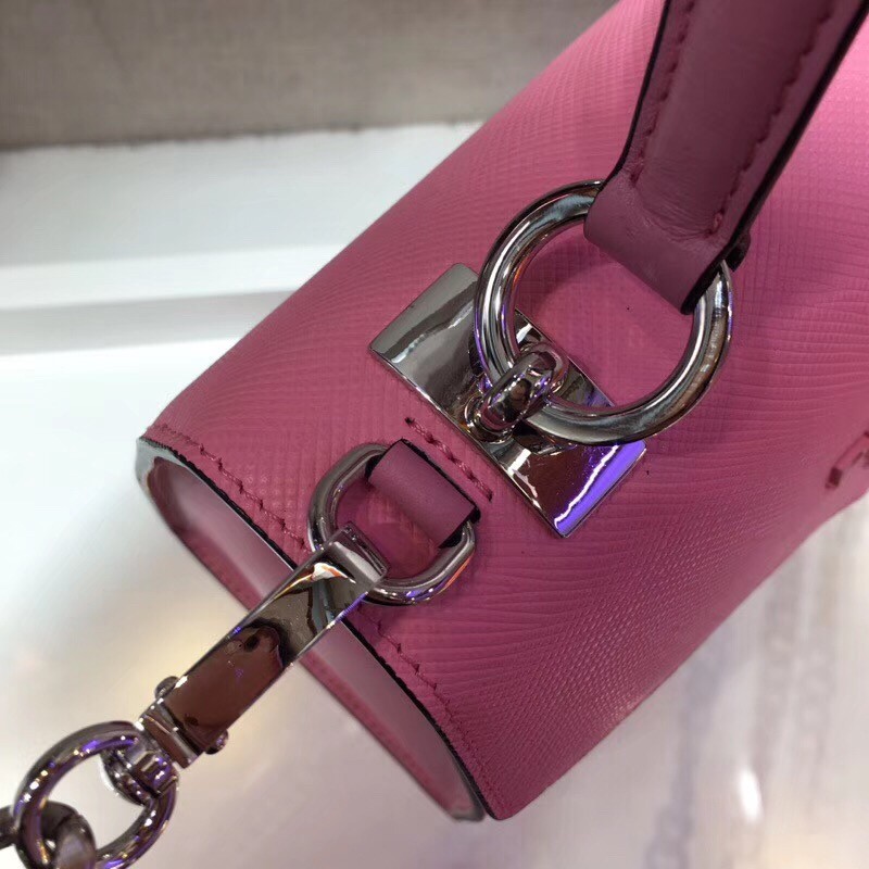 pra*a monoCh*0me top handle bag in pink saffiano leather