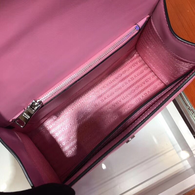 pra*a monoCh*0me top handle bag in pink saffiano leather