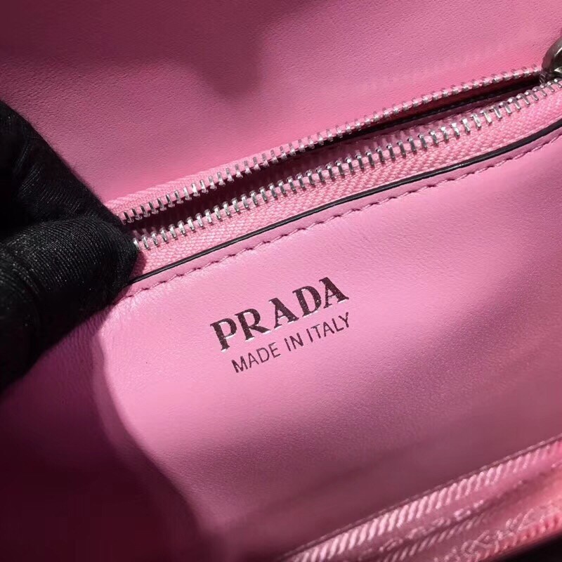 pra*a monoCh*0me top handle bag in pink saffiano leather