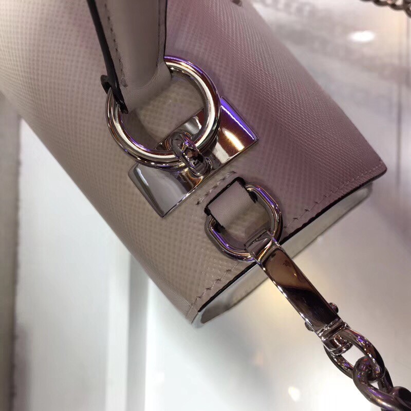 pra*a monoCh*0me top handle bag in white saffiano leather