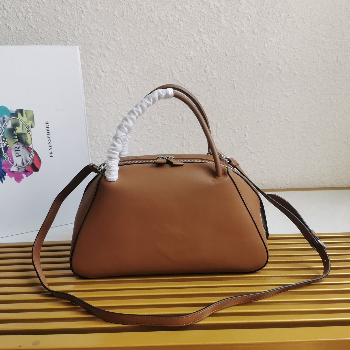 pra*a S*pernova medium handbag in brown leather