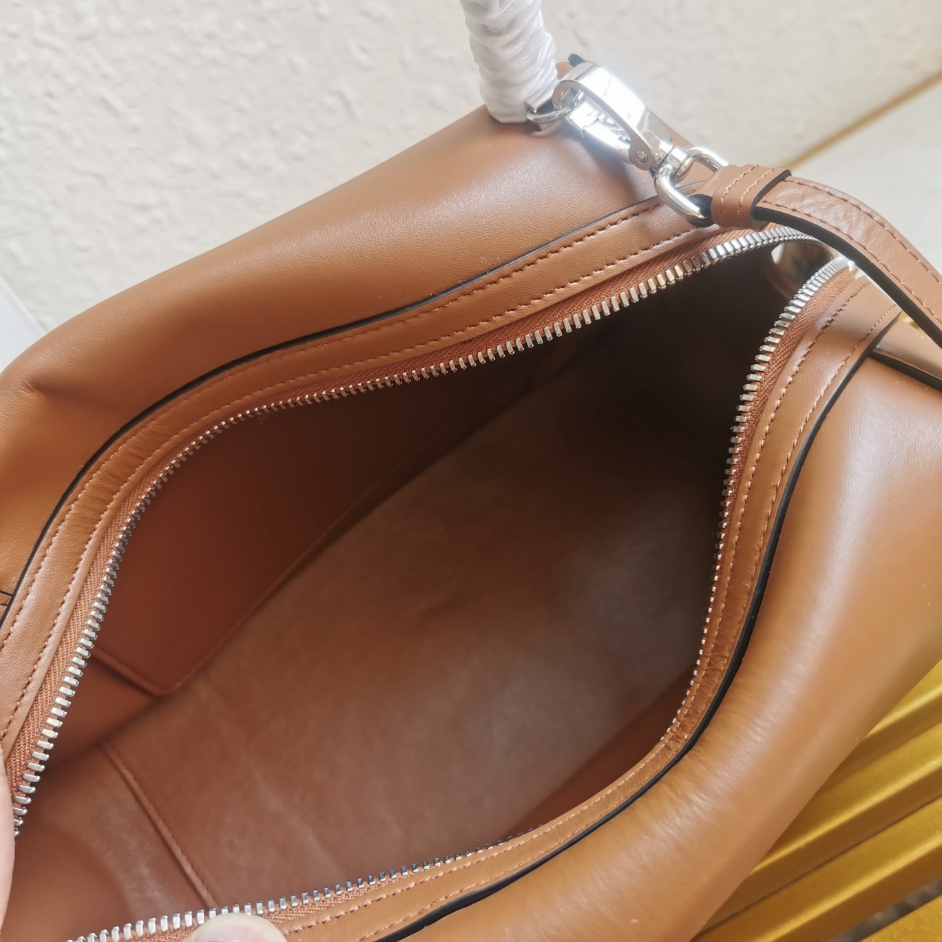 pra*a S*pernova medium handbag in brown leather
