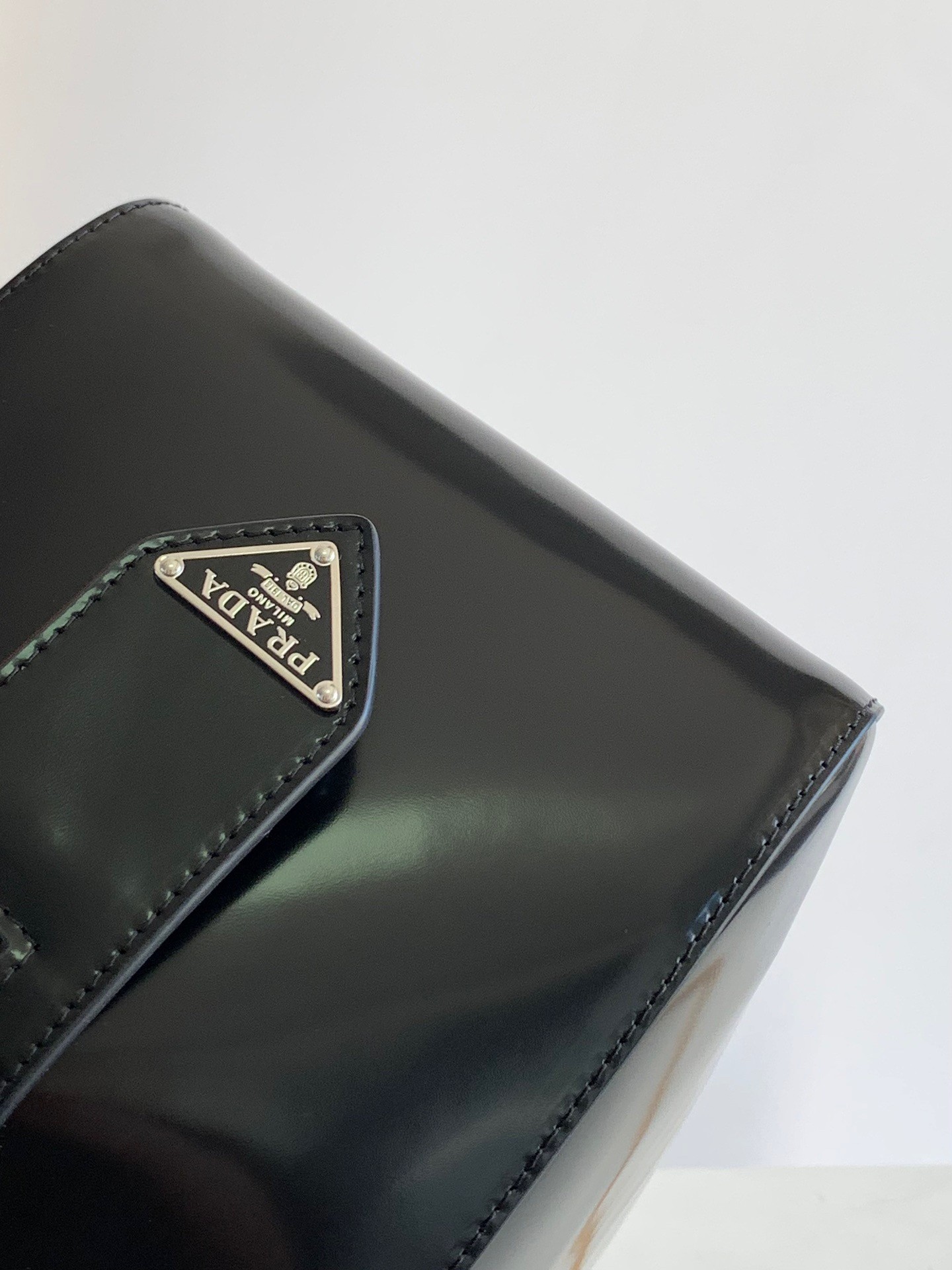 pra*a S*pernova small handbag in black brushed leather