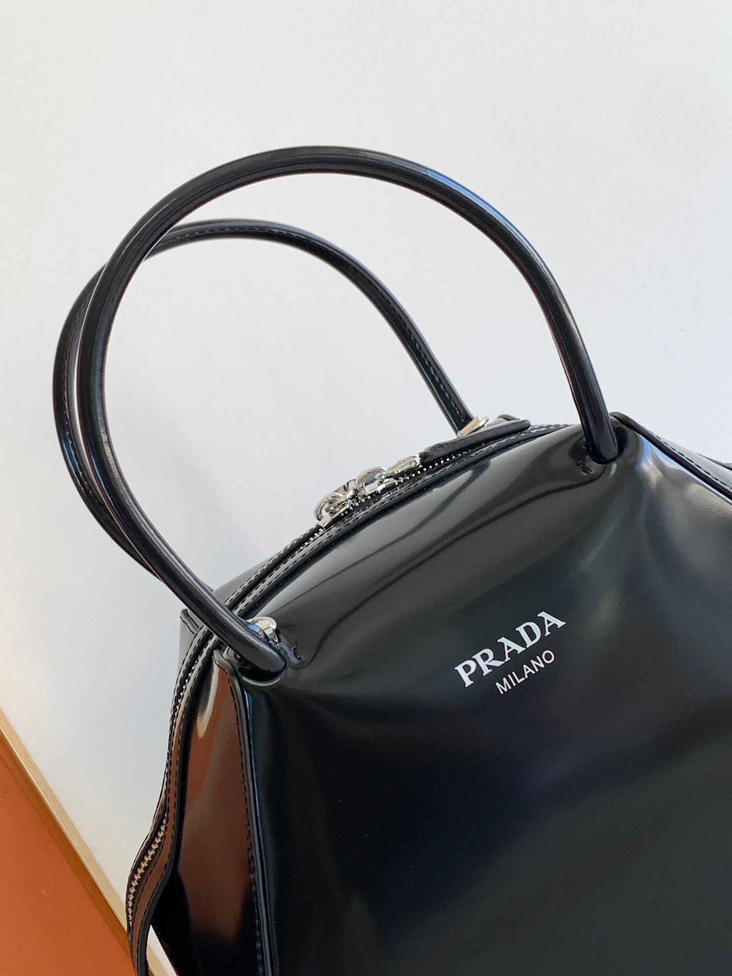 pra*a S*pernova small handbag in black brushed leather