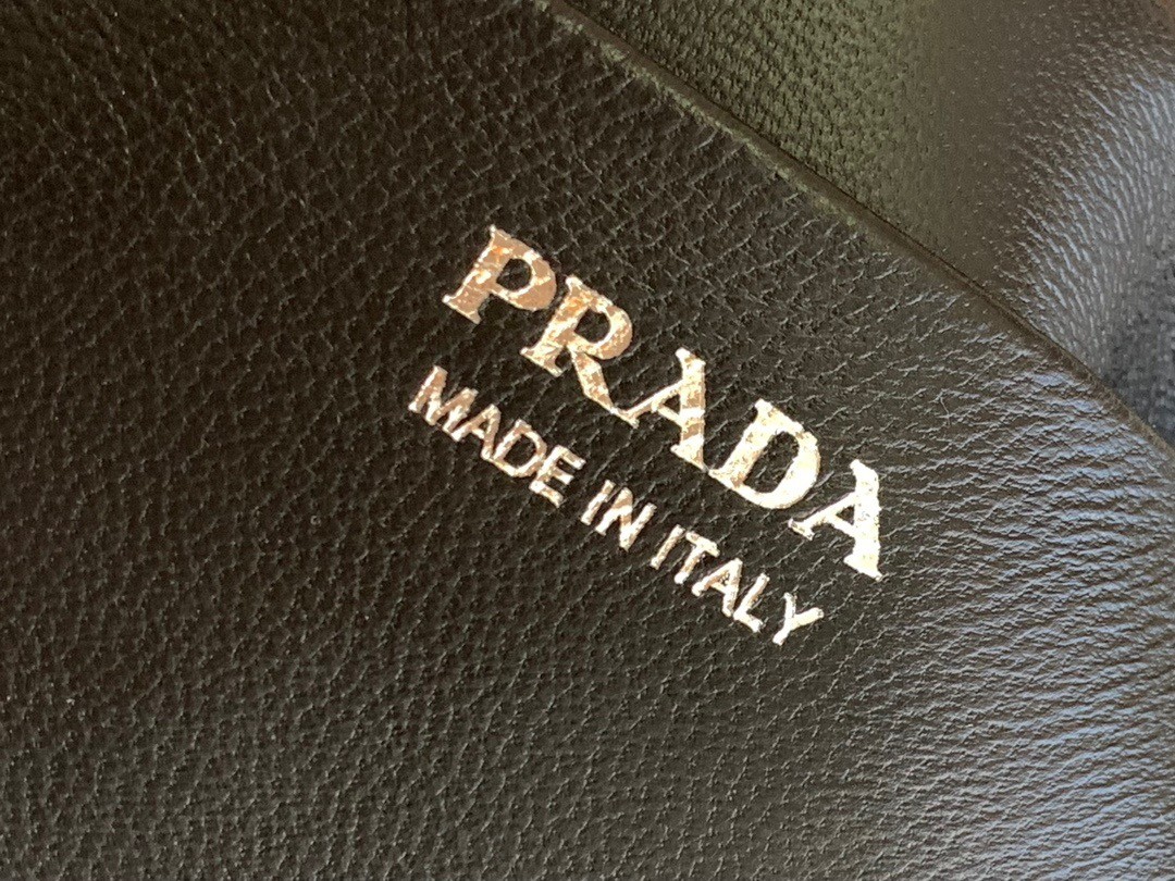 pra*a S*pernova small handbag in black brushed leather