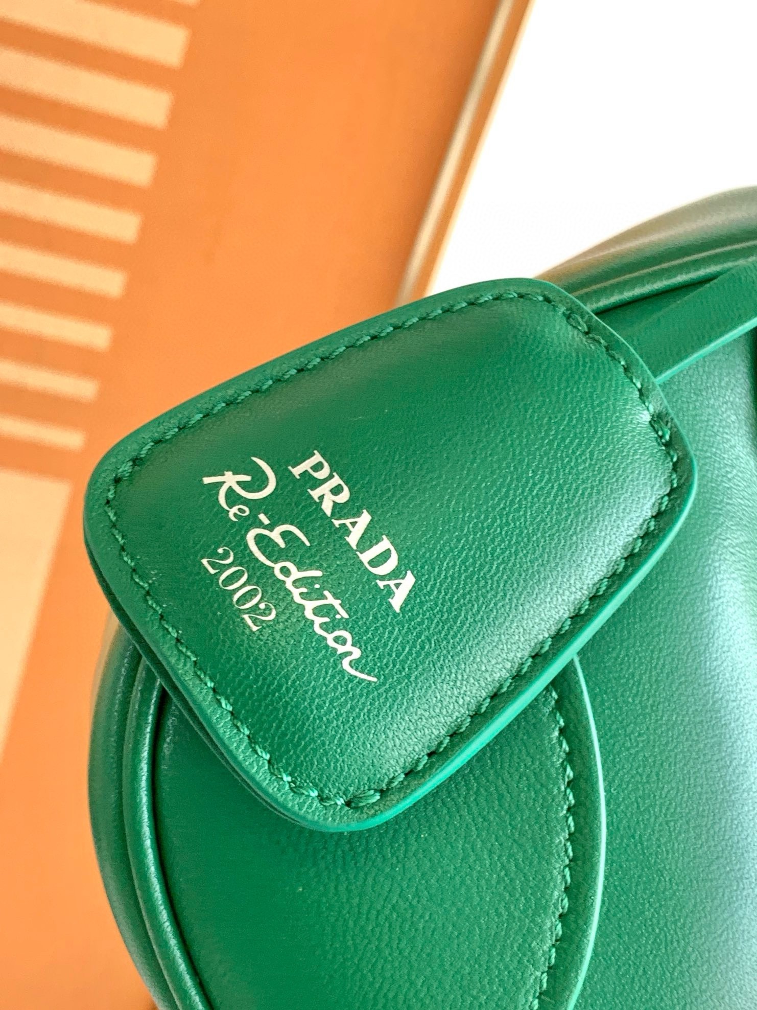 Pra*a moon bag in green padded nappa leather