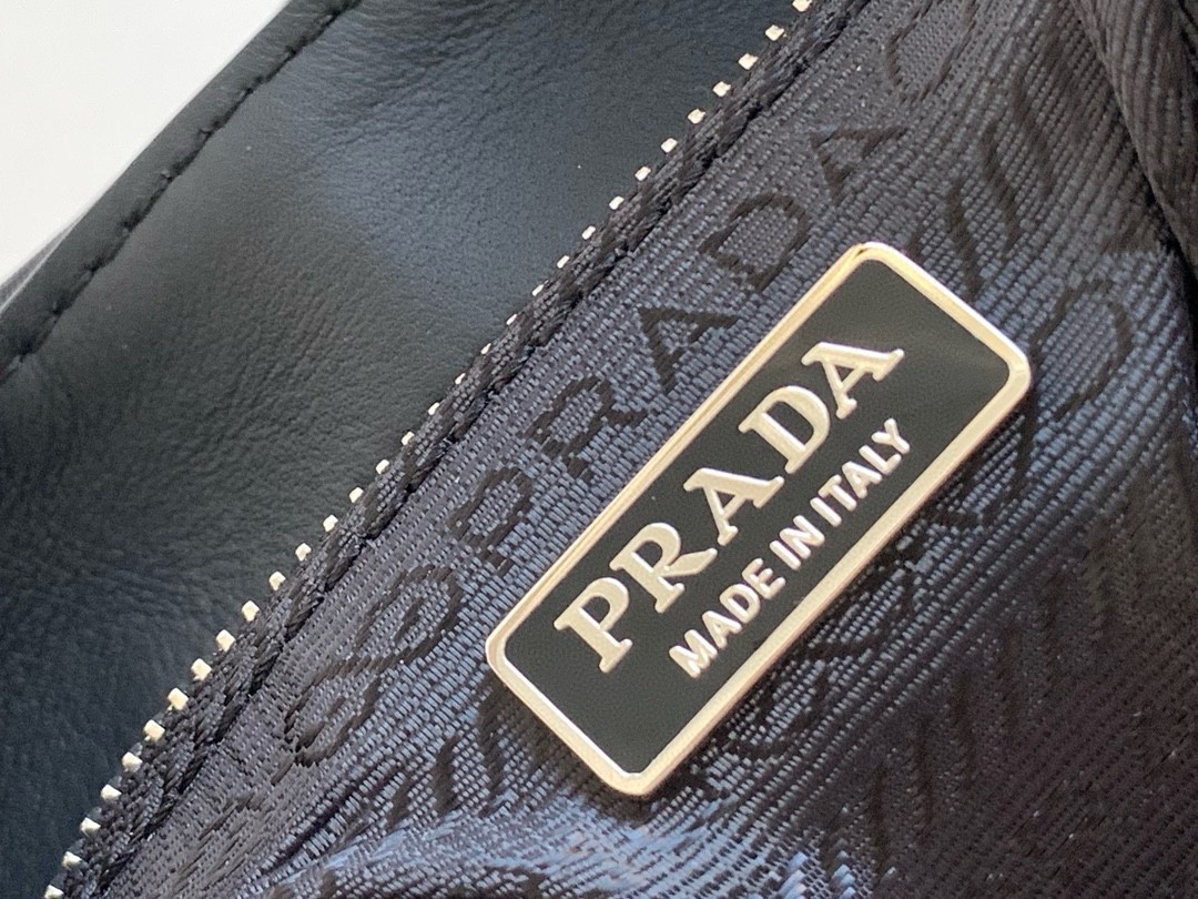 Pra*a moon bag in black padded nappa leather