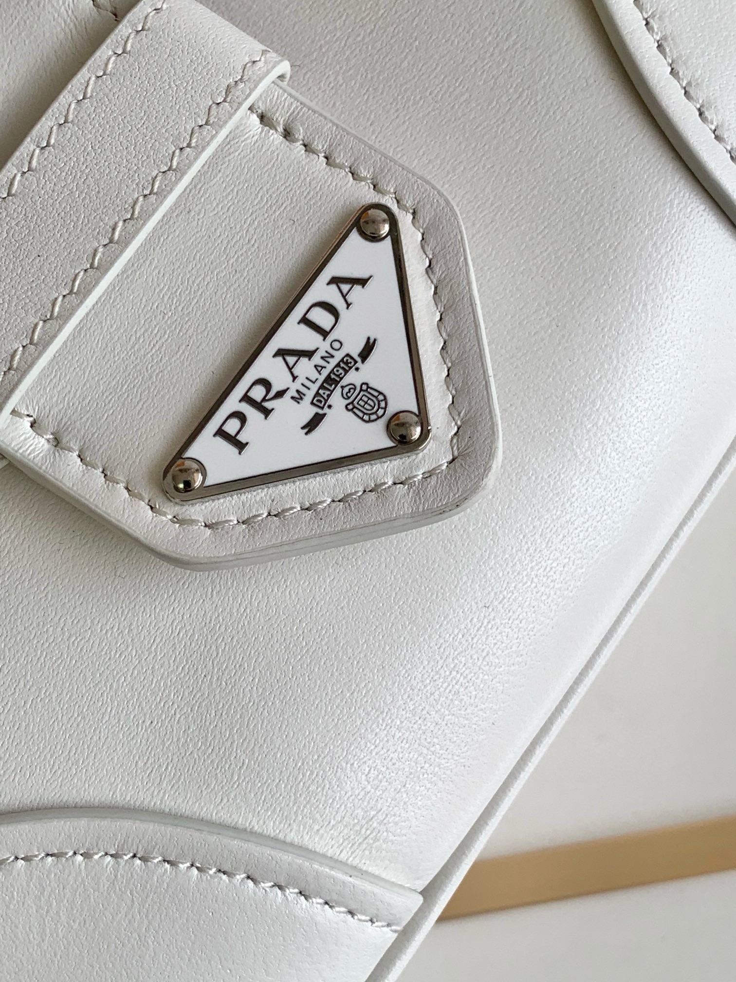 Pra*a moon bag in white padded nappa leather