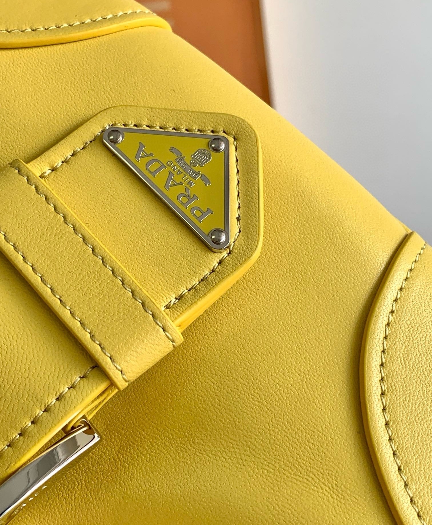 Pra*a moon bag in yellow padded nappa leather