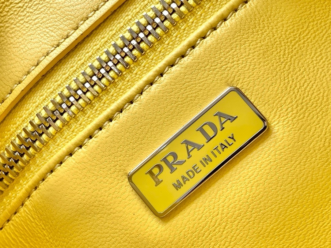 Pra*a moon bag in yellow padded nappa leather
