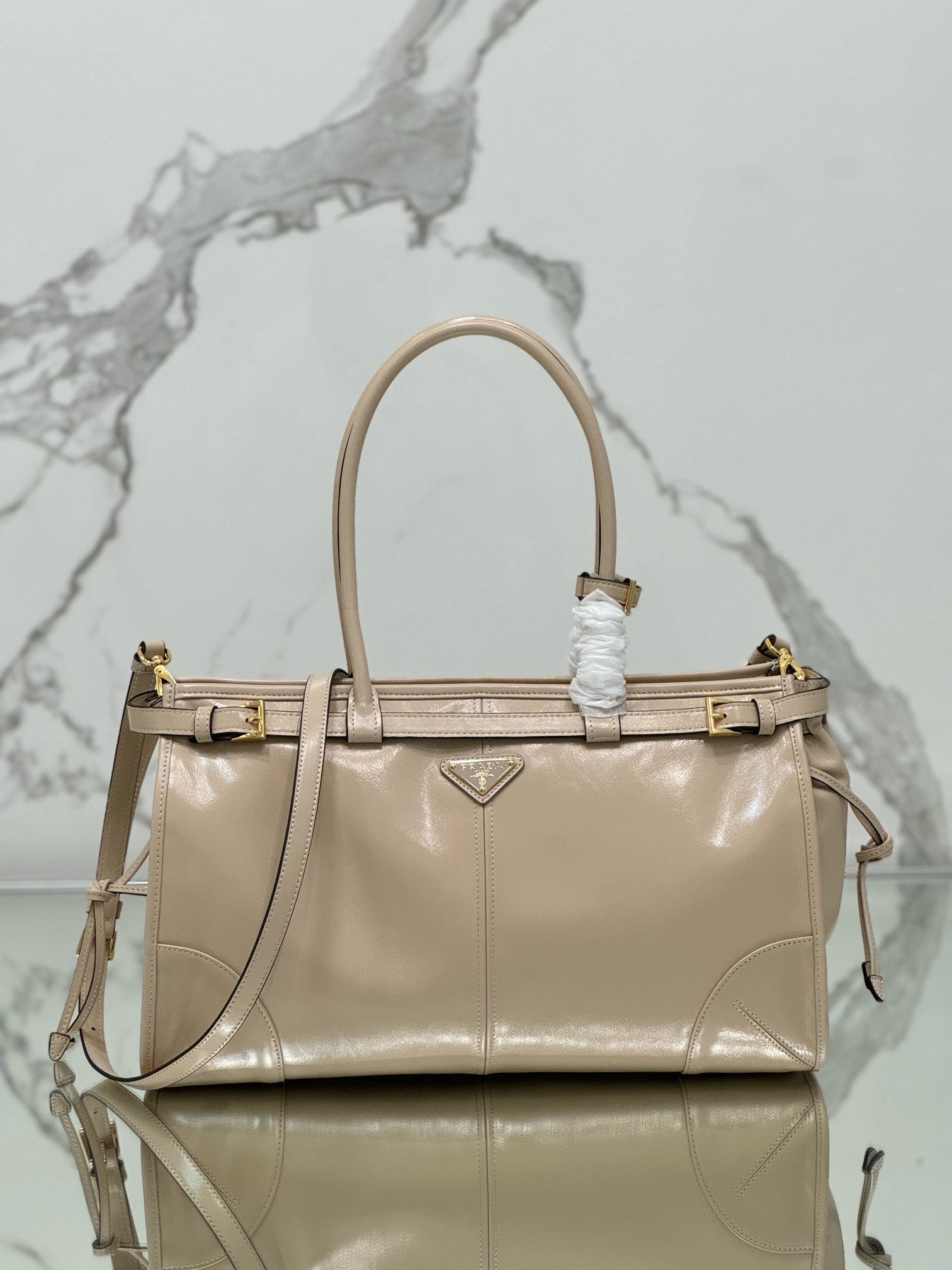 Pra*a large tote bag in beige soft leather