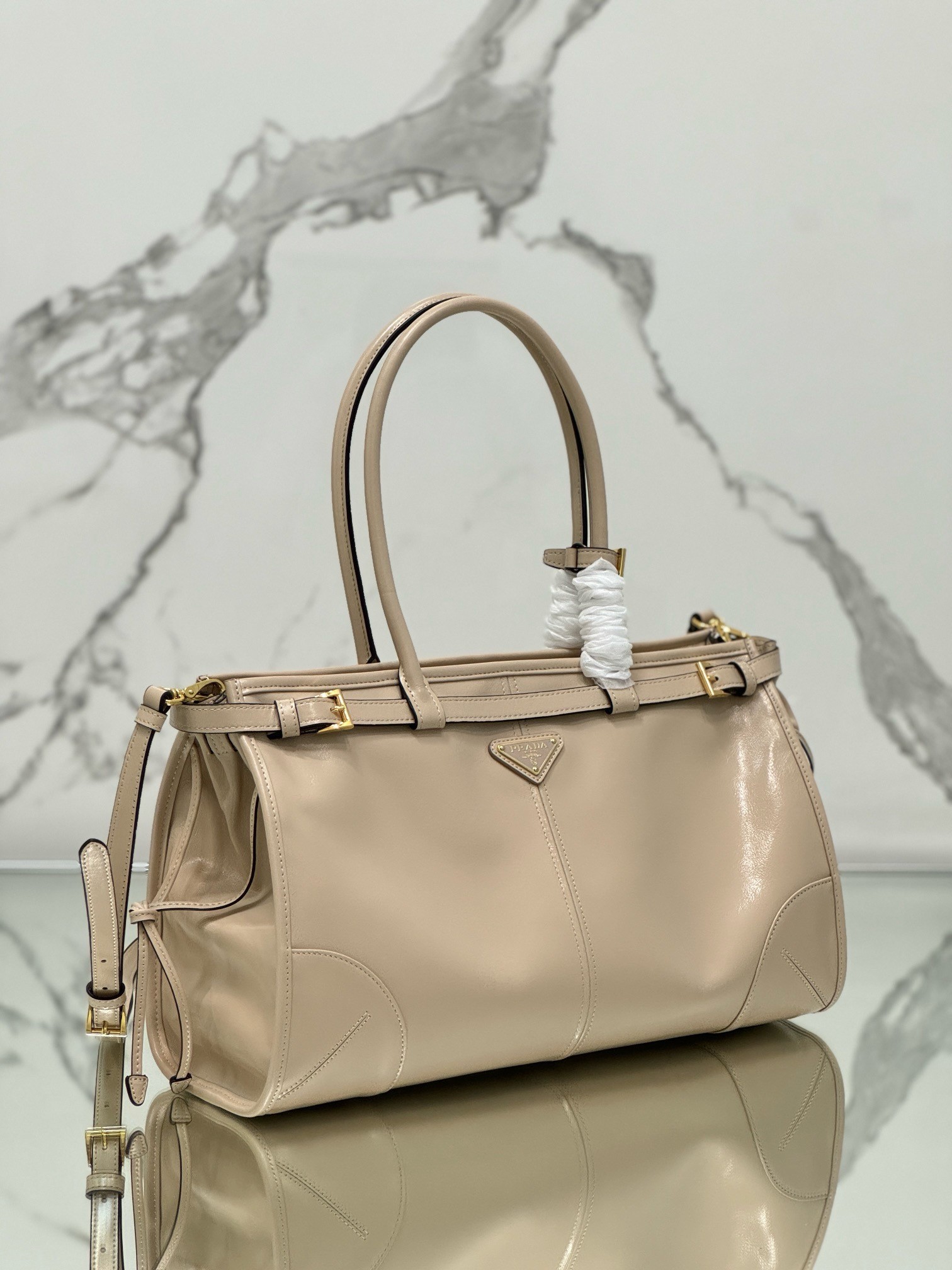 Pra*a large tote bag in beige soft leather