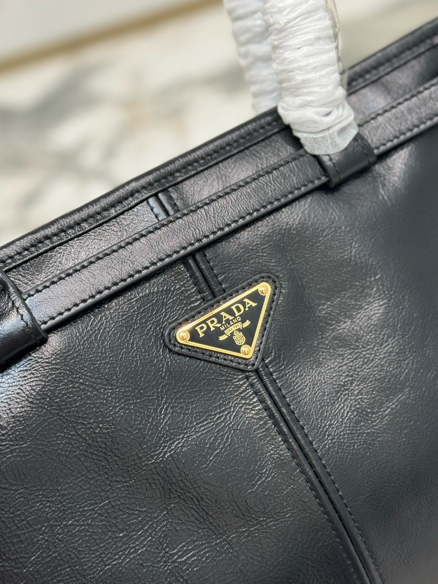 Pra*a large tote bag in black soft leather