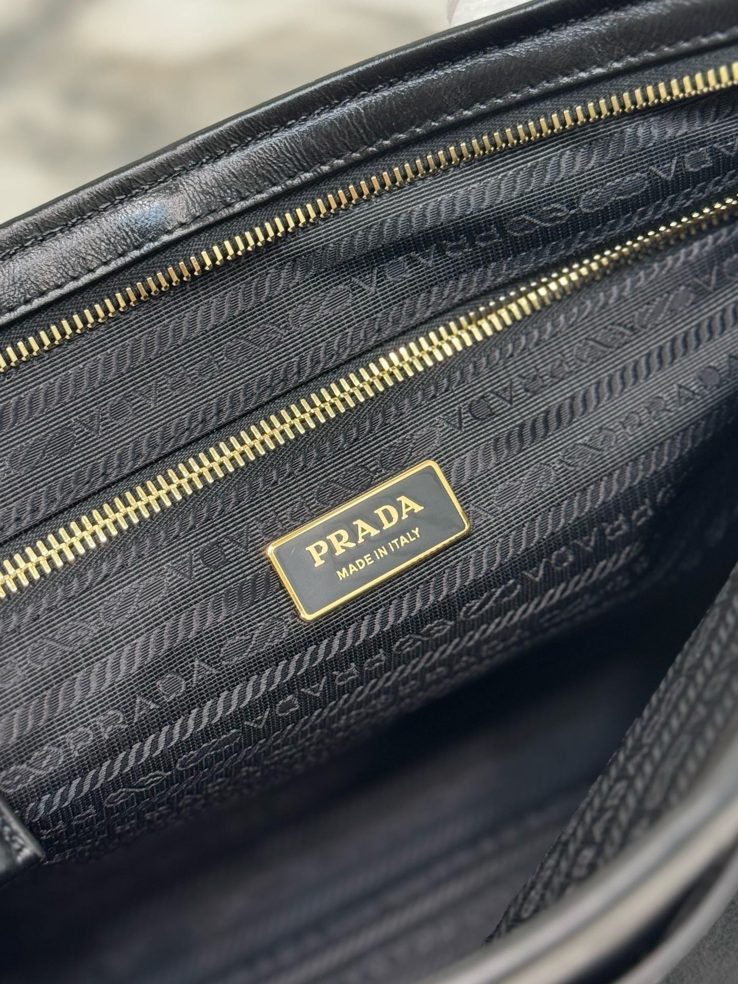 Pra*a large tote bag in black soft leather