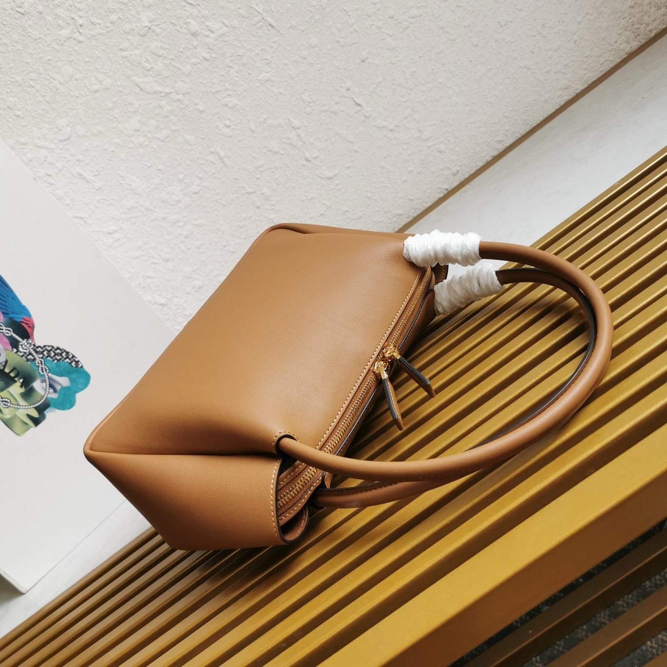 Pra*a shoulder bag in brown calfskin with triangle logo