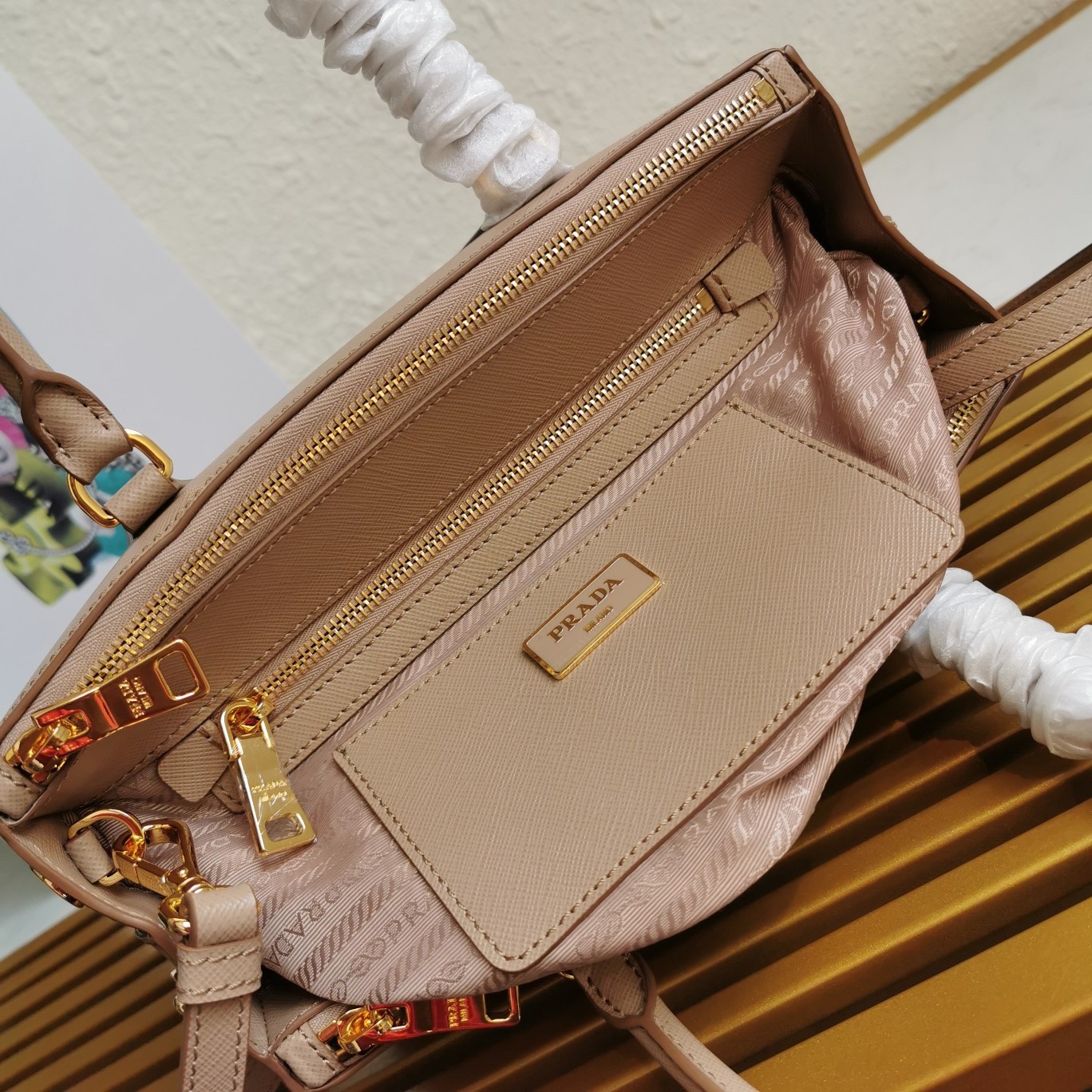 Pra*a small galleria bag in beige saffiano leather