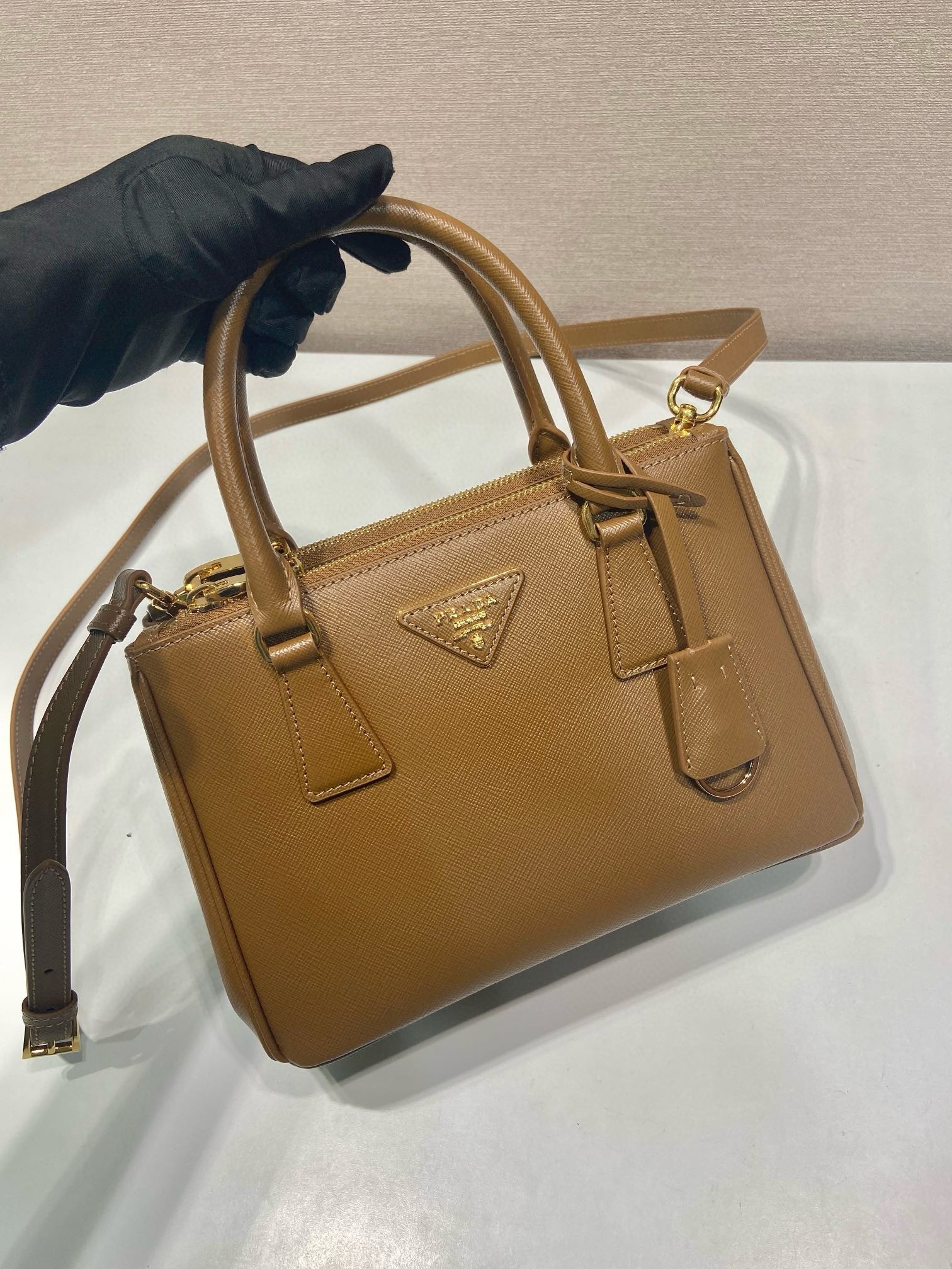 Pra*a galleria small bag in caramel saffiano leather