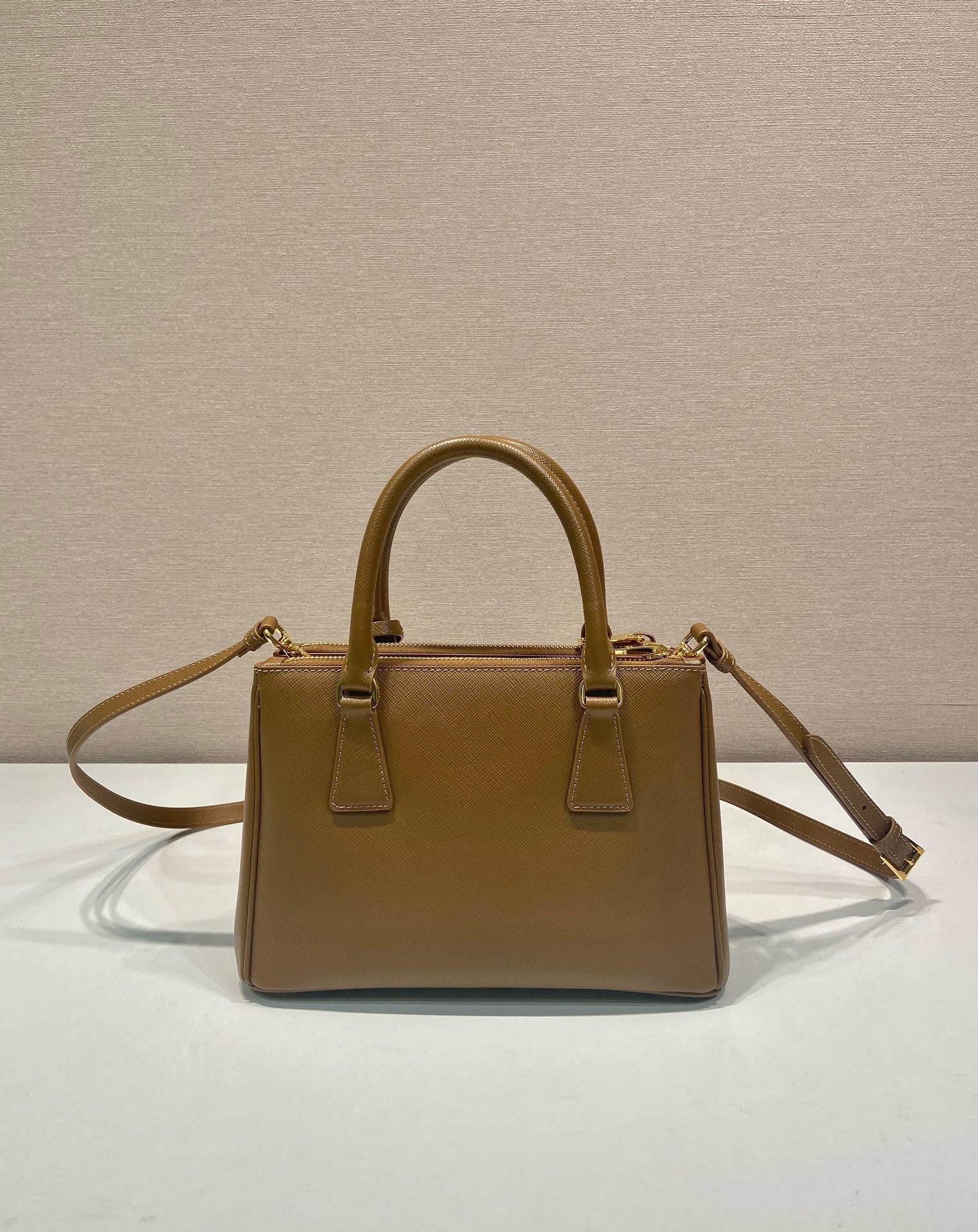 Pra*a galleria small bag in caramel saffiano leather