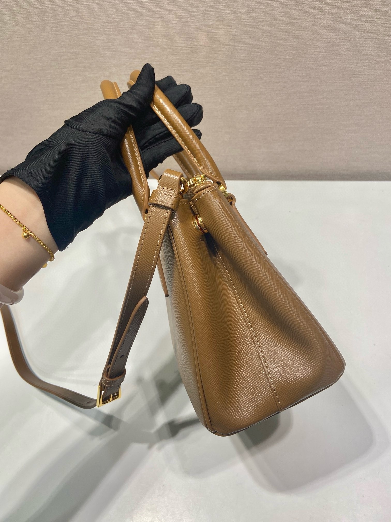 Pra*a galleria small bag in caramel saffiano leather