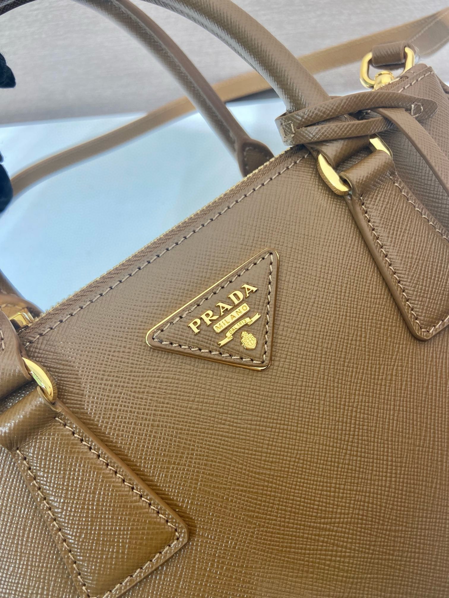 Pra*a galleria small bag in caramel saffiano leather