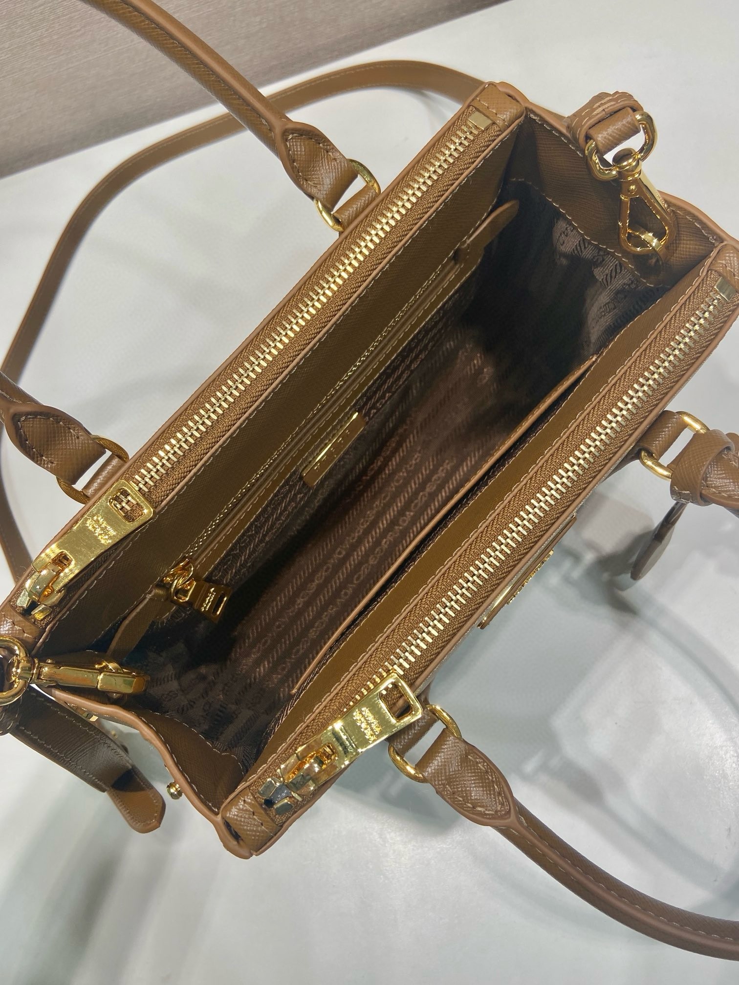Pra*a galleria small bag in caramel saffiano leather
