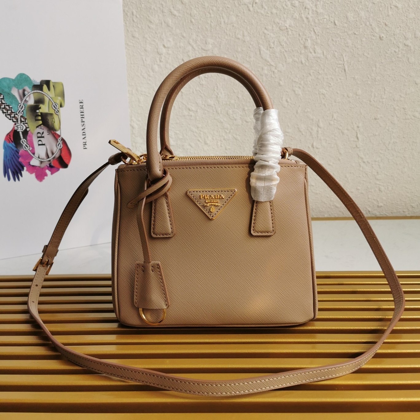 Pra*a mini galleria bag in beige saffiano leather
