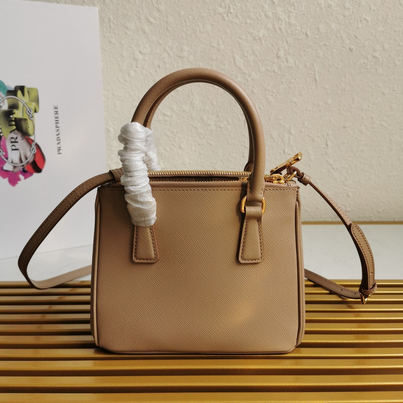 Pra*a mini galleria bag in beige saffiano leather