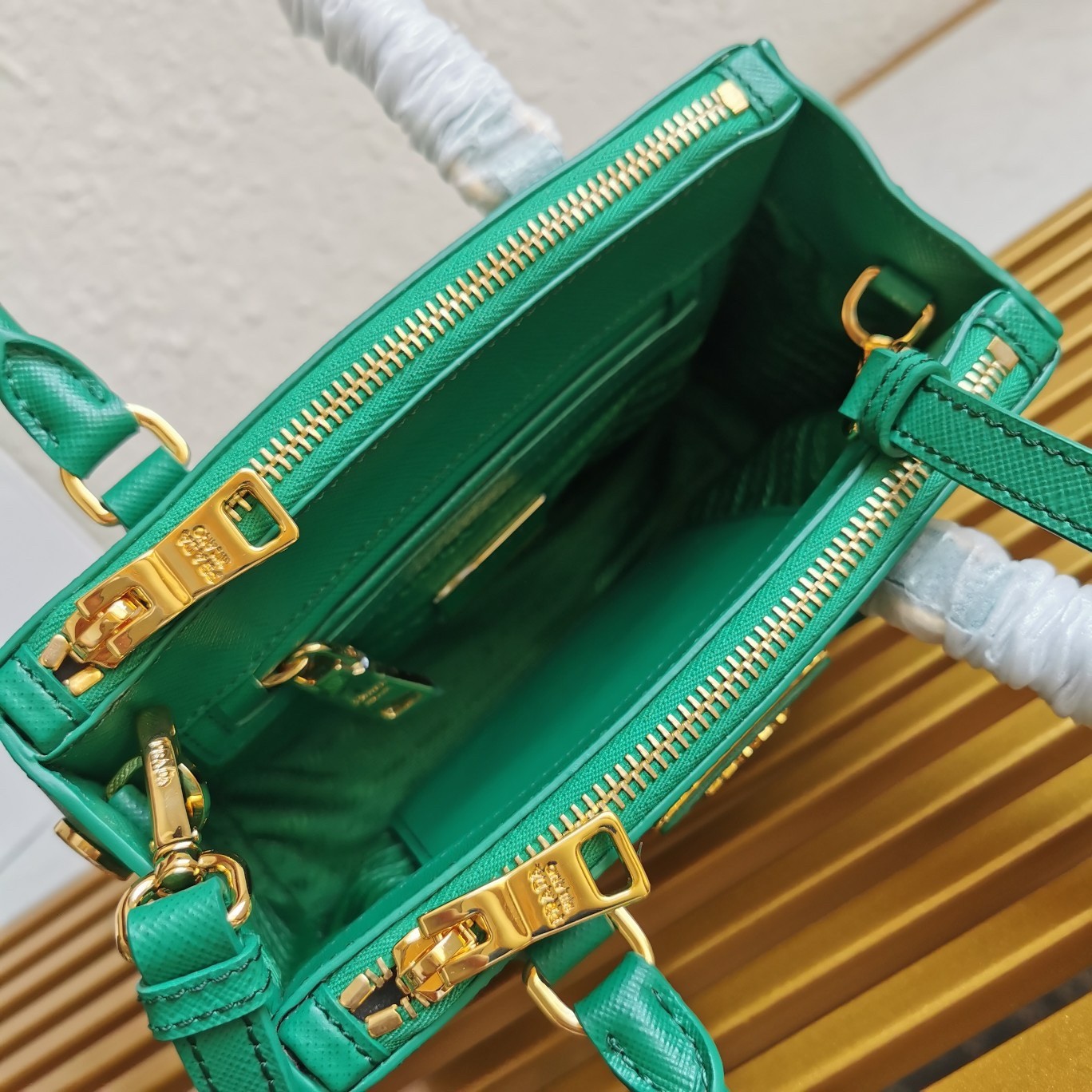 Pra*a mini galleria bag in green saffiano leather