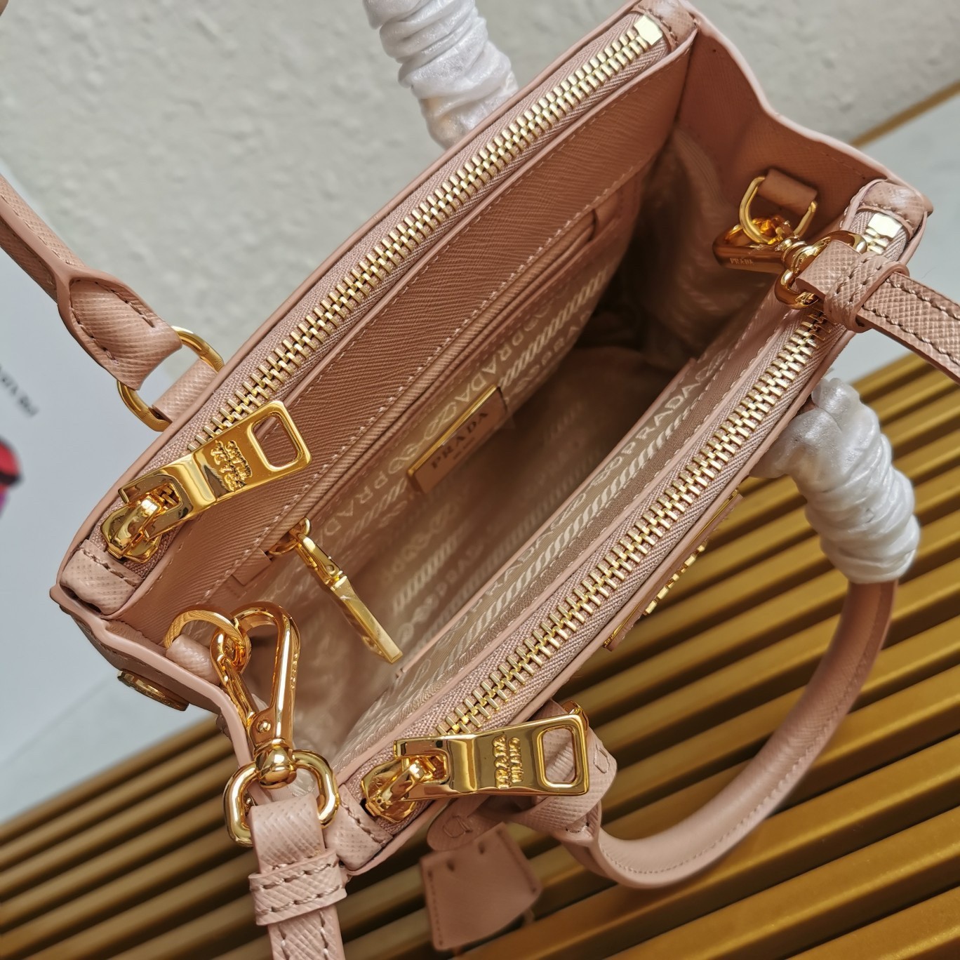 Pra*a mini galleria bag in powder pink saffiano leather