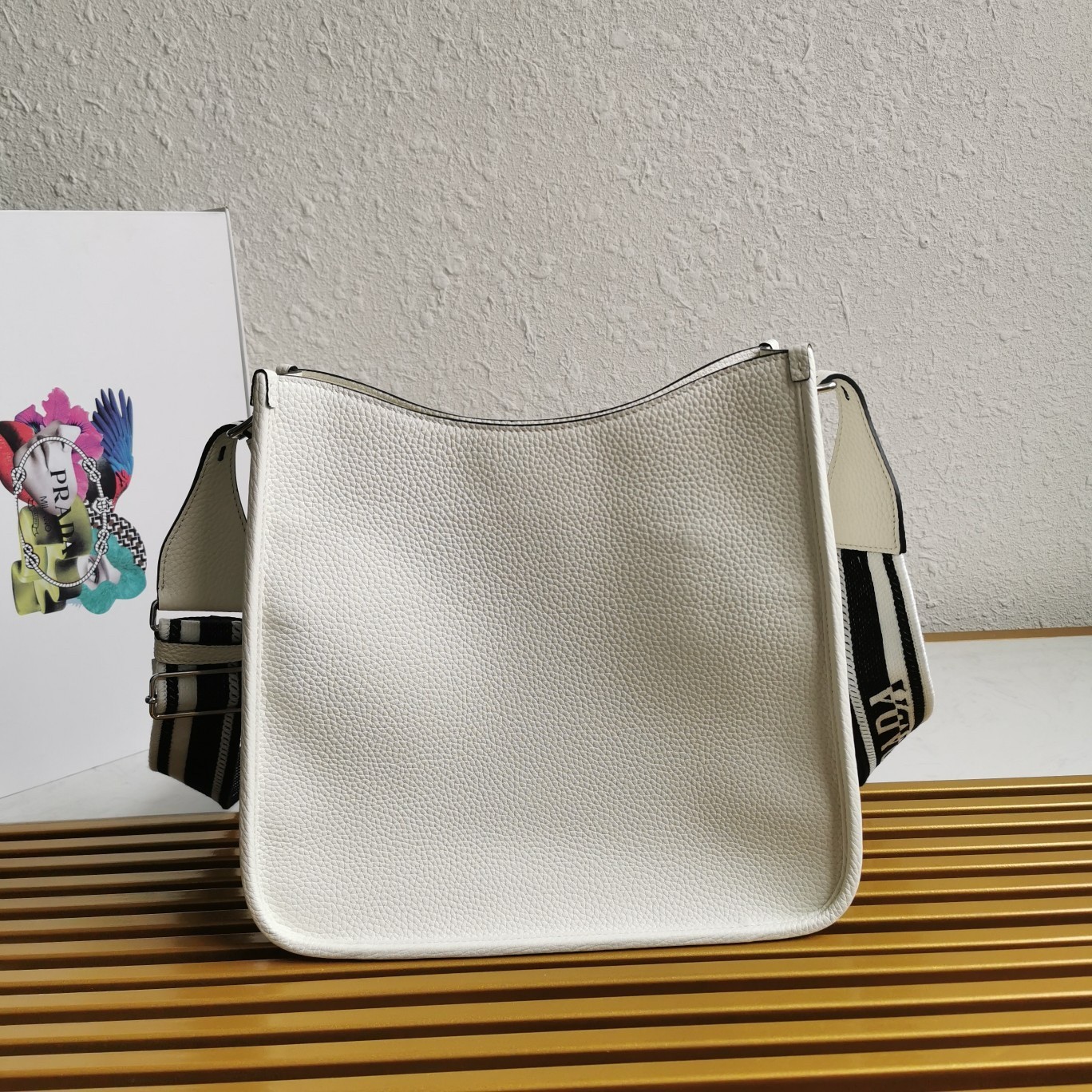 Pra*a hobo bag in white grained leather