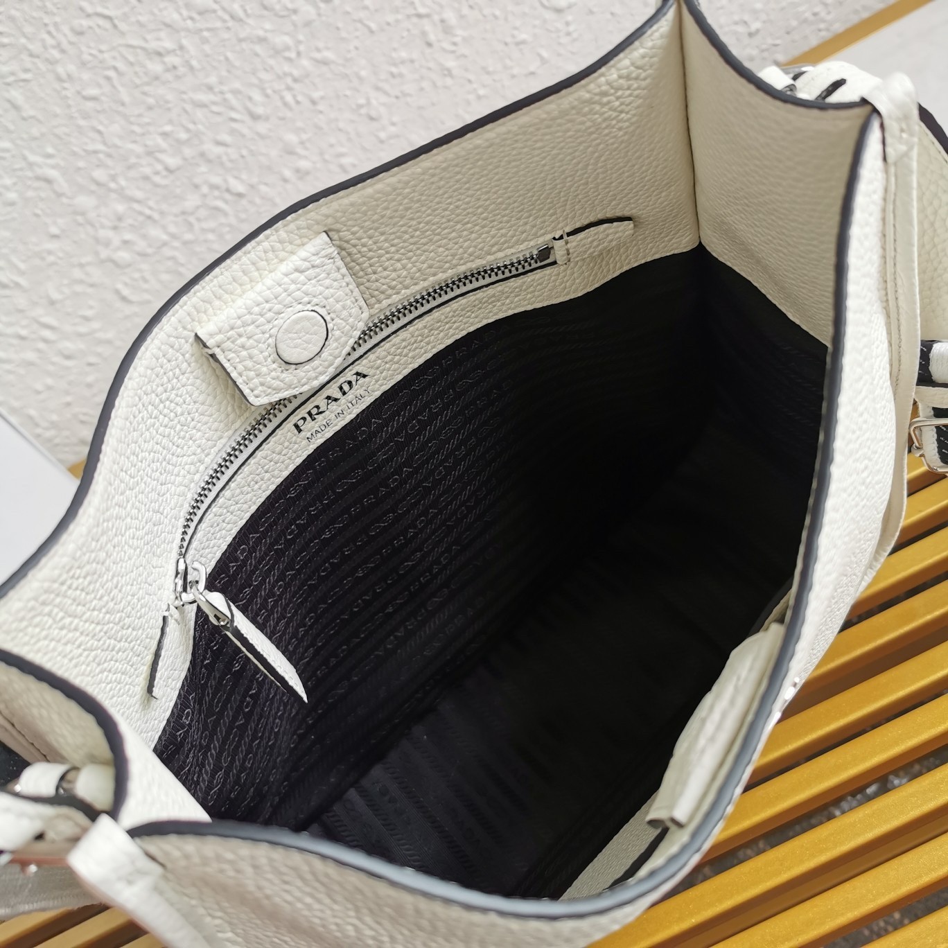 Pra*a hobo bag in white grained leather