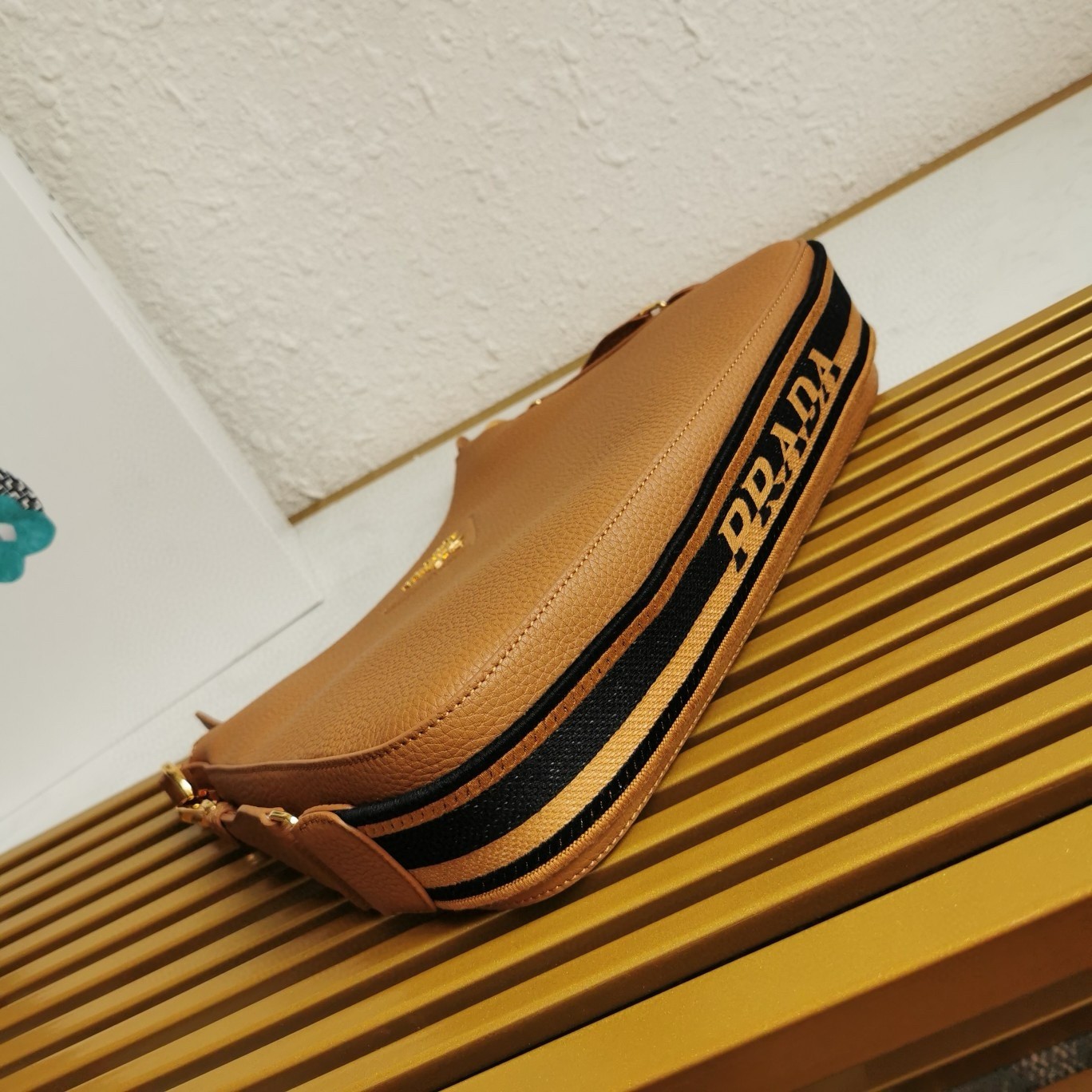 Pra*a shoulder bag in brown grained leather