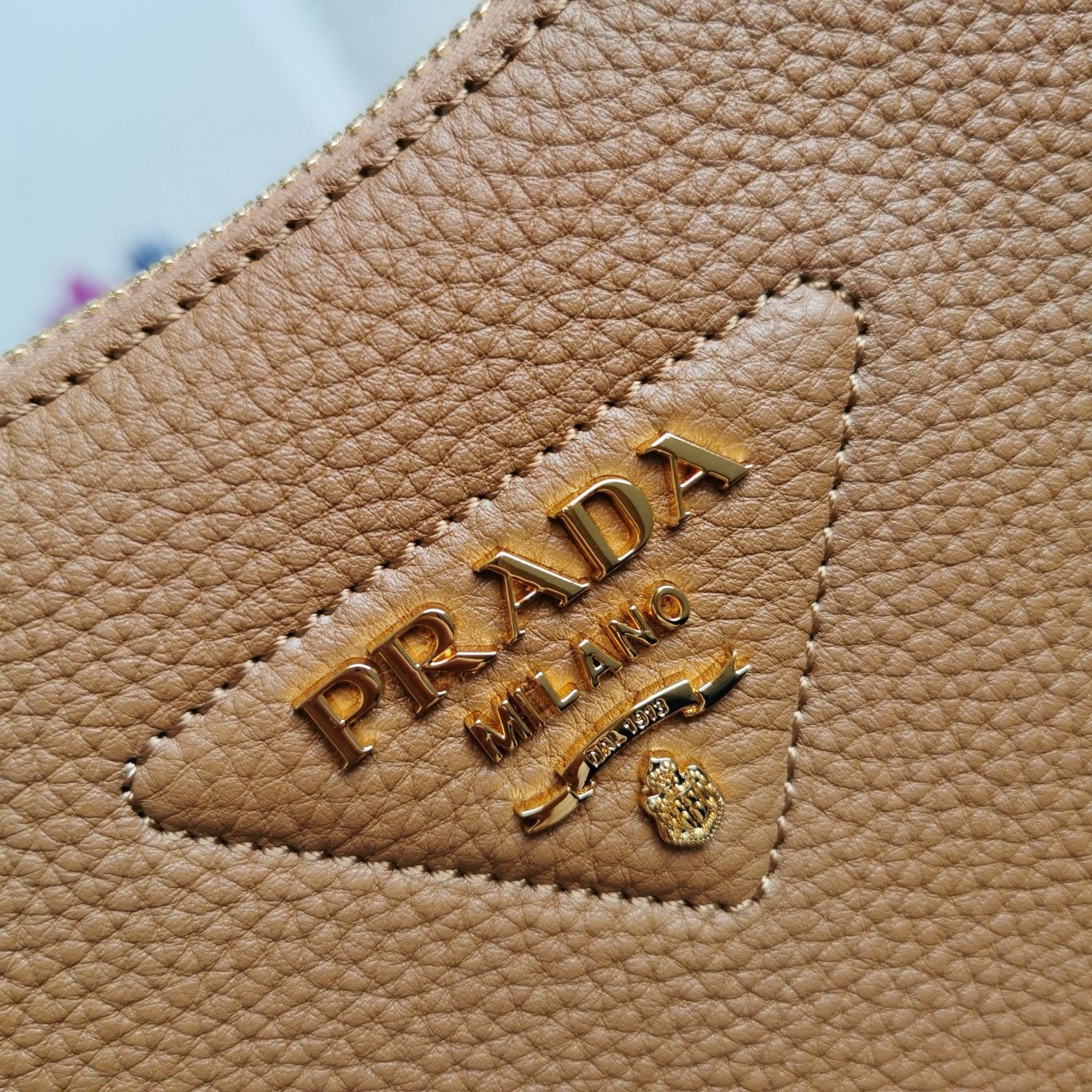 Pra*a shoulder bag in brown grained leather